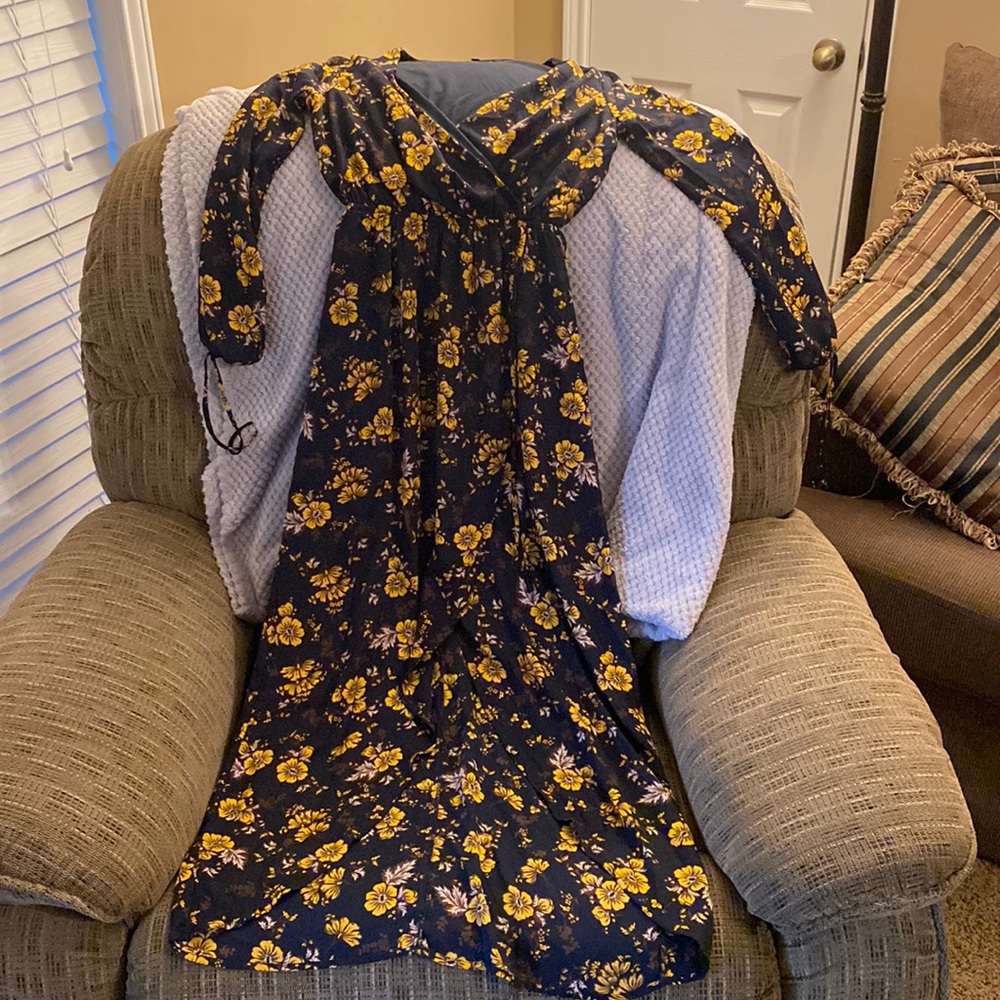 Dress with short  front and long  back, just looks like a “peep a boo”